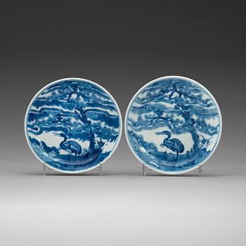 448. A pair of blue and white small dishes, Qing dynasty with Guangxu six characters mark and of period.