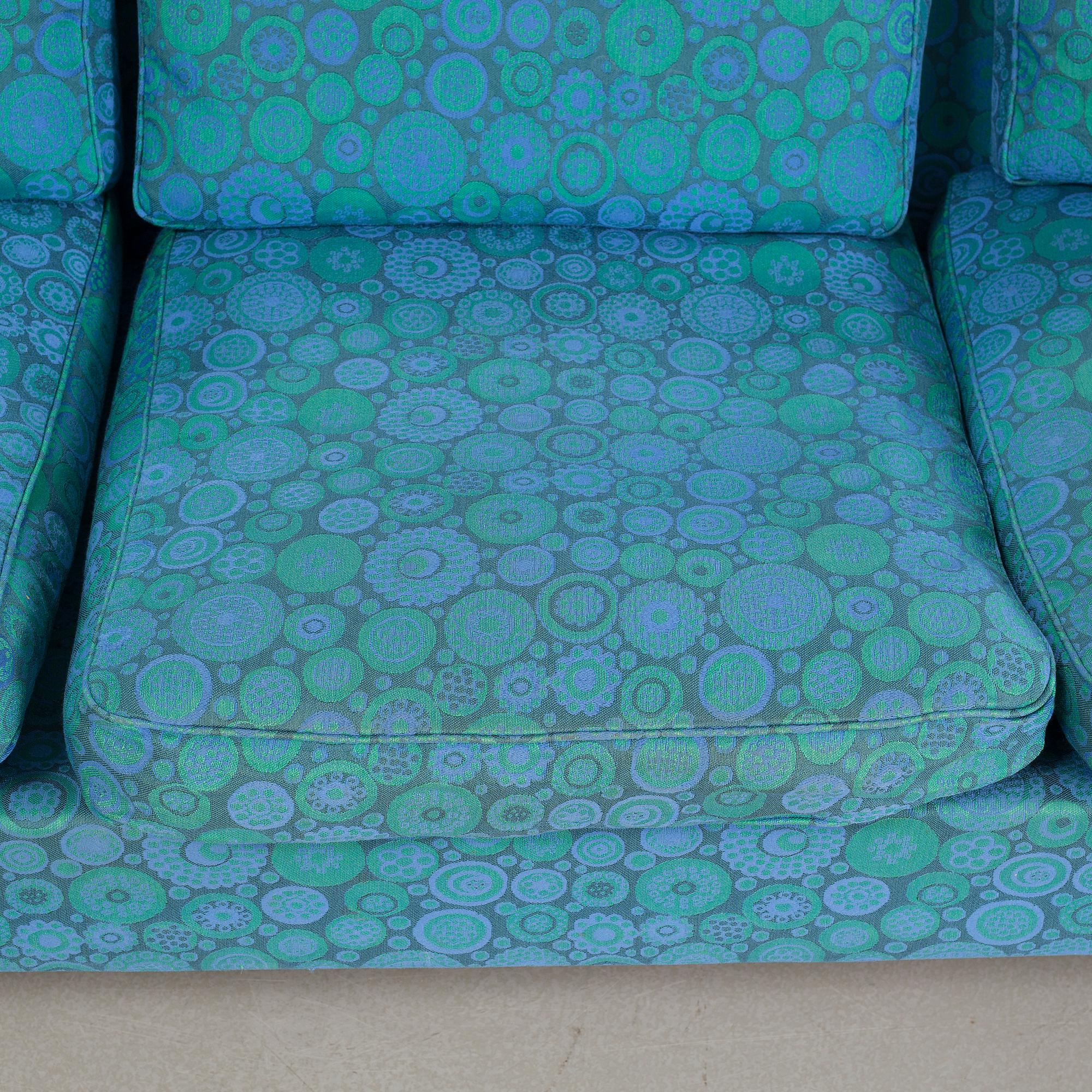 A 1960s "Oklahoma" sofa and armchair by Folke Ohlsson for Dux Möbel AB.