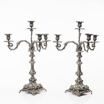 A pair of silver plated Rococo style candelabra, 20th century.