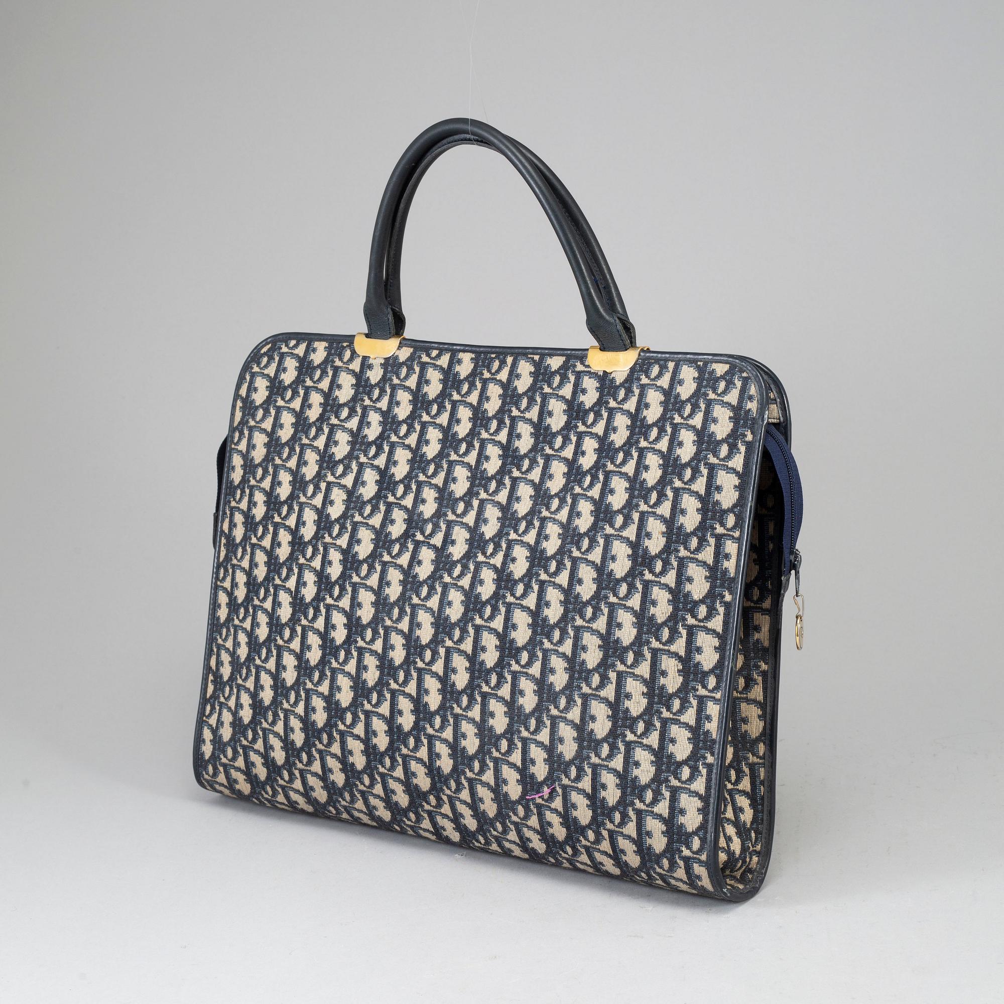 CHRISTIAN DIOR, a canvas bag.