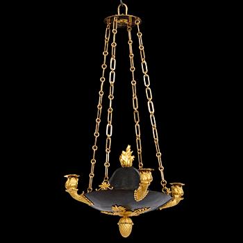 139. A Swedish Empire four-light hanging-lamp, first part of the 19th century.