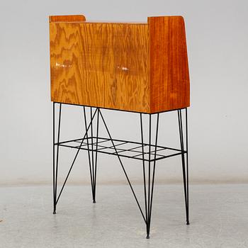 A Swedish teak veneered 'Bang' secretaire, circa 1960s, from Ikea.