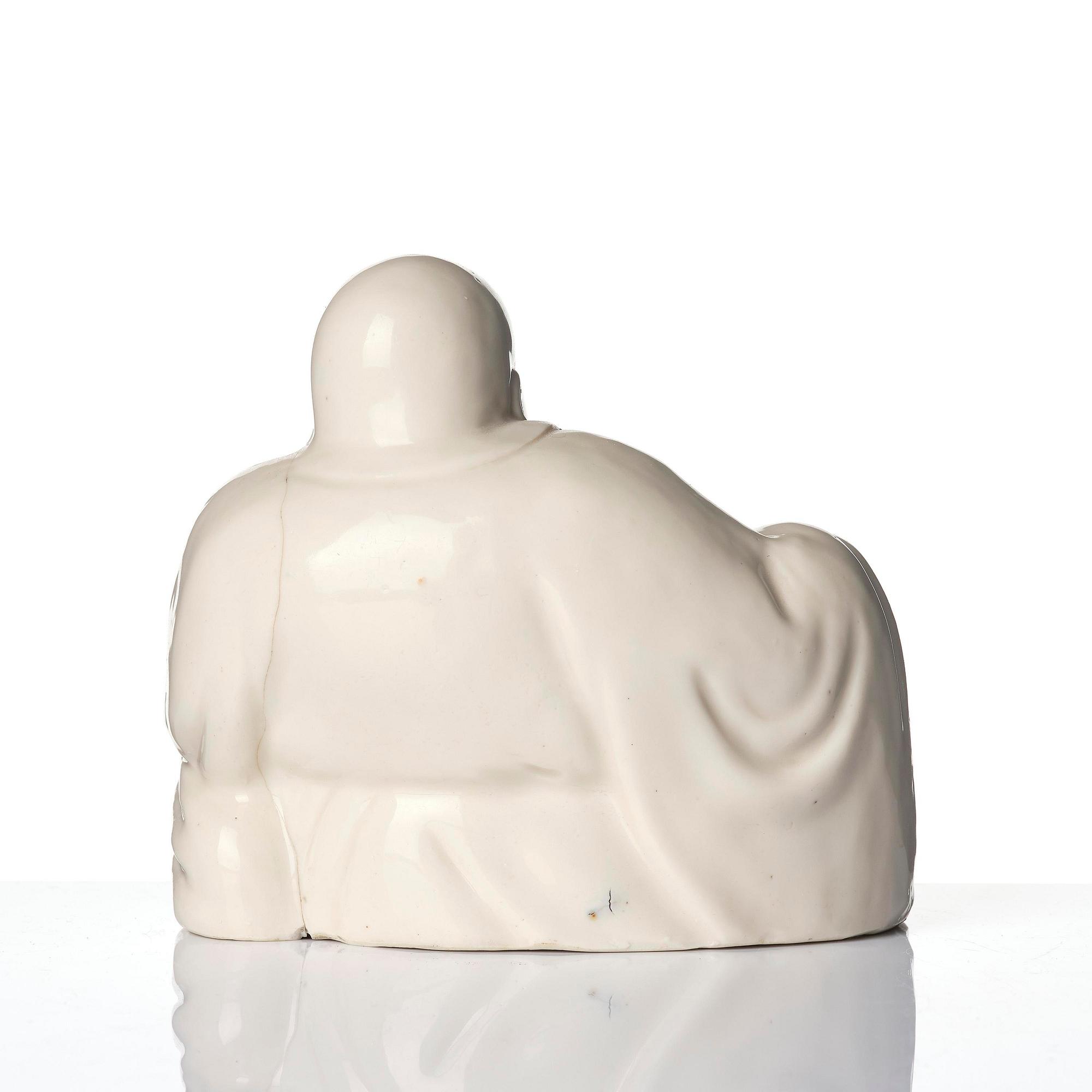 A blanc de chine figure of Budai, Qing dynasty, 18/19th century.