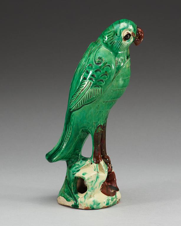 A green glazed falcon, Qing dynasty.