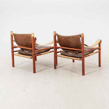 Arne Norell, a pair of Sirocco armchairs.