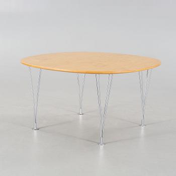 A coffee table named "Supercirkel", designed by Piet Hein and Bruno Mathsson.
