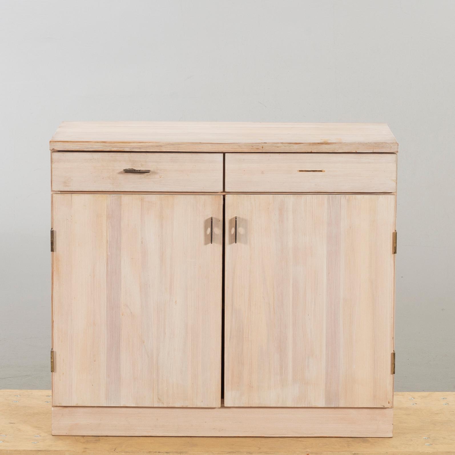 A CUPBOARD "SOLD FORM" DESIGN OLOF PIRA.