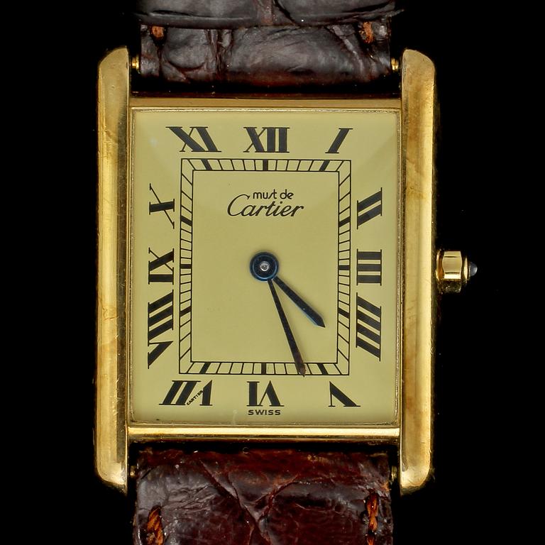 ARMBANDSUR, förgyllt silver, must de Cartier, Tank. Vikt 24 g.