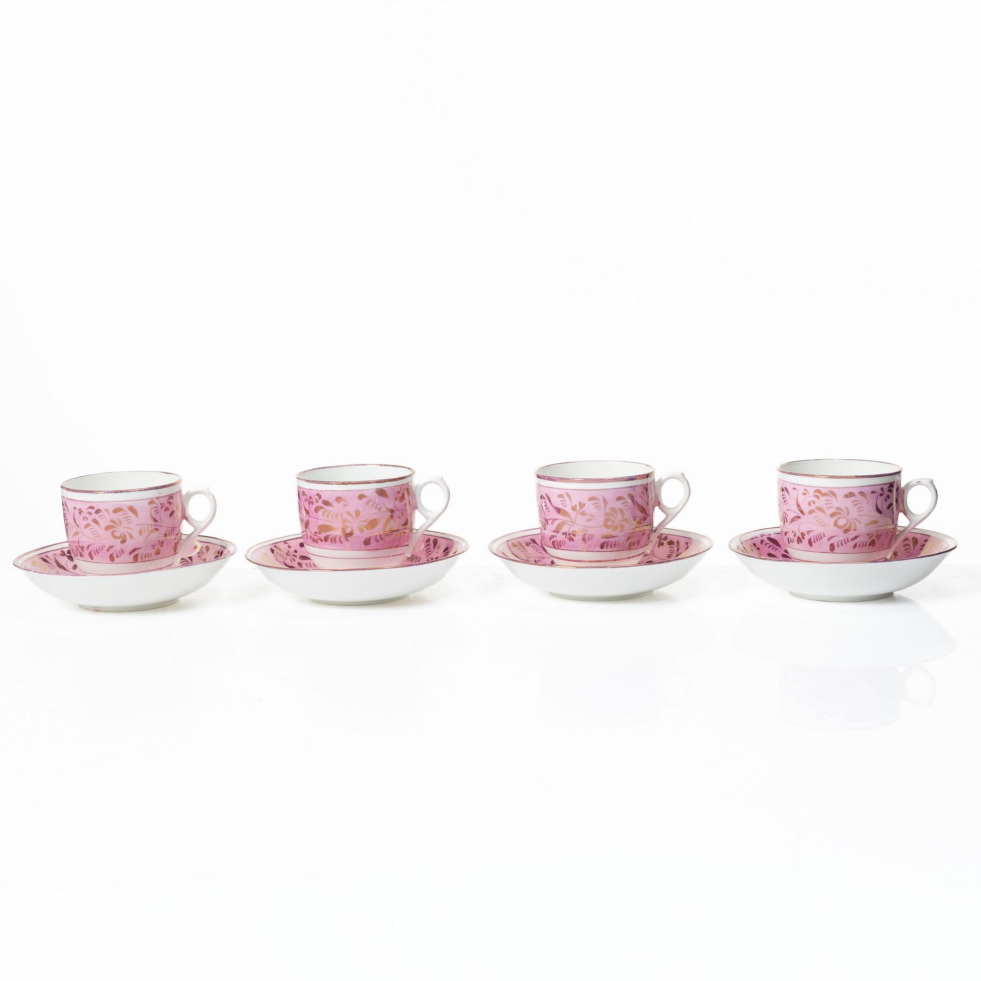 Twelve cups and saucers, England, 19th century.