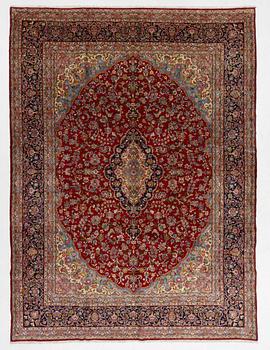 A carpet, semi-antique Kirman, signed, circa 400 x 300 cm.