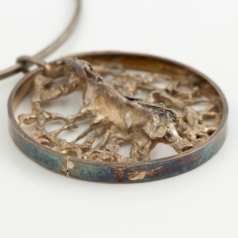 Lars Arby, four pendants with a chain and a neck ring, silver, Gothenburg 1965, 1969, 1976 and 1982.