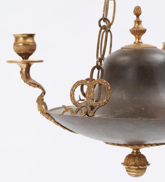 An Empire early 19th century three-light hanging lamp.