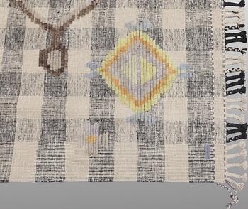 A kilim carpet with relief, 361 x 273 cm.