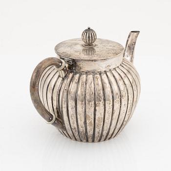 A silver teapot, bearing the mark of K. Andersson, Stcokholm, 1905.