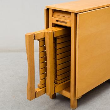 A gateleg table and 4 chairs, late 20th century.