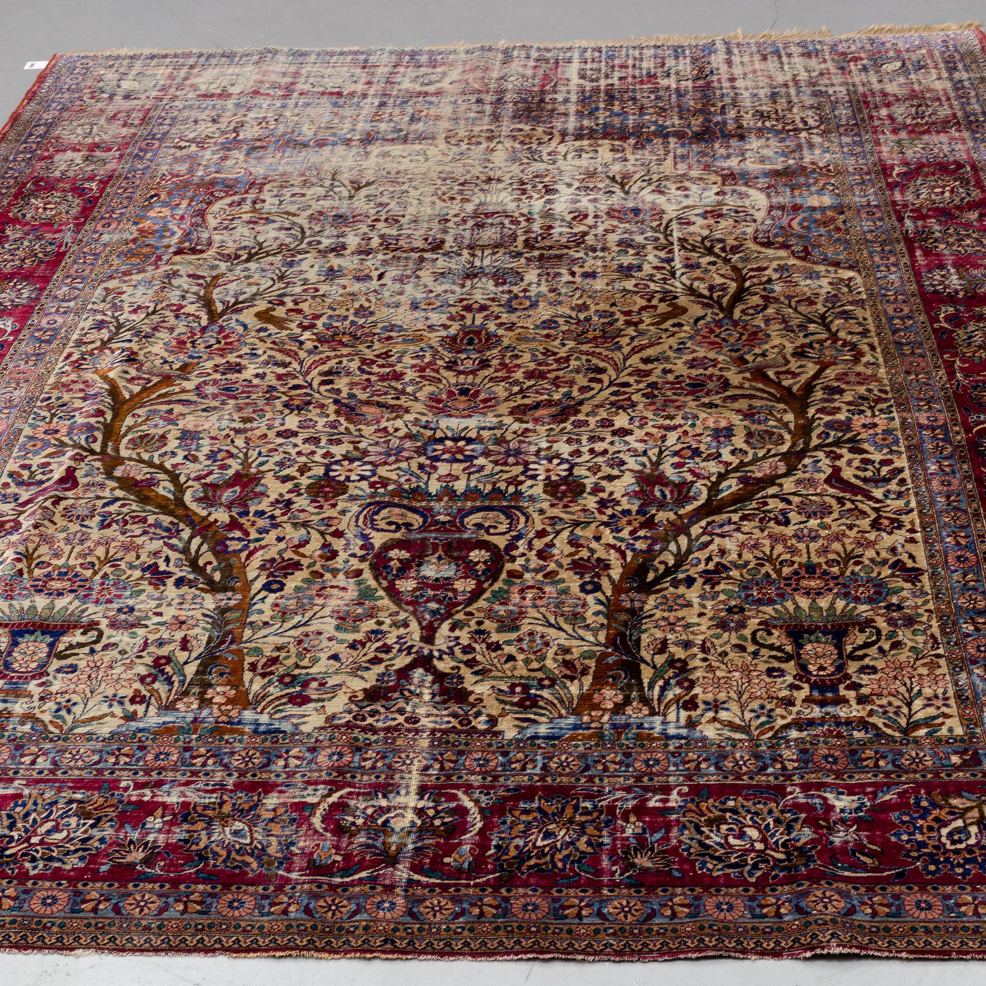 A semi-antique silk Kashan, ca 316 x 205.
