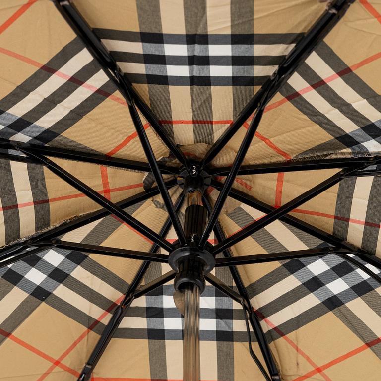 Burberry, an umbrella.