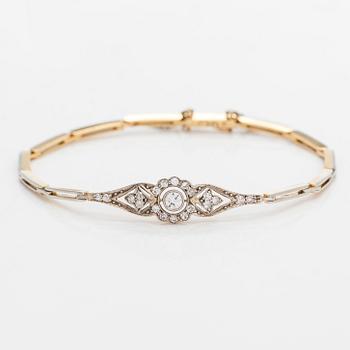Rannekoru, 18K kultaa timantteja yhteensä noin 0.50 ct. Suomalaiset leimat.