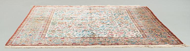 A CARPET, "Golo Bolbol" (="Flower and bird"-motive), a silk Esfahan figural, ca 337 x 243,5 cm, Mohammad Seirafian.