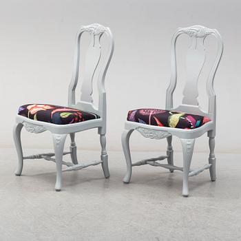 A rococo style dining table and six chairs, end of 20th century.