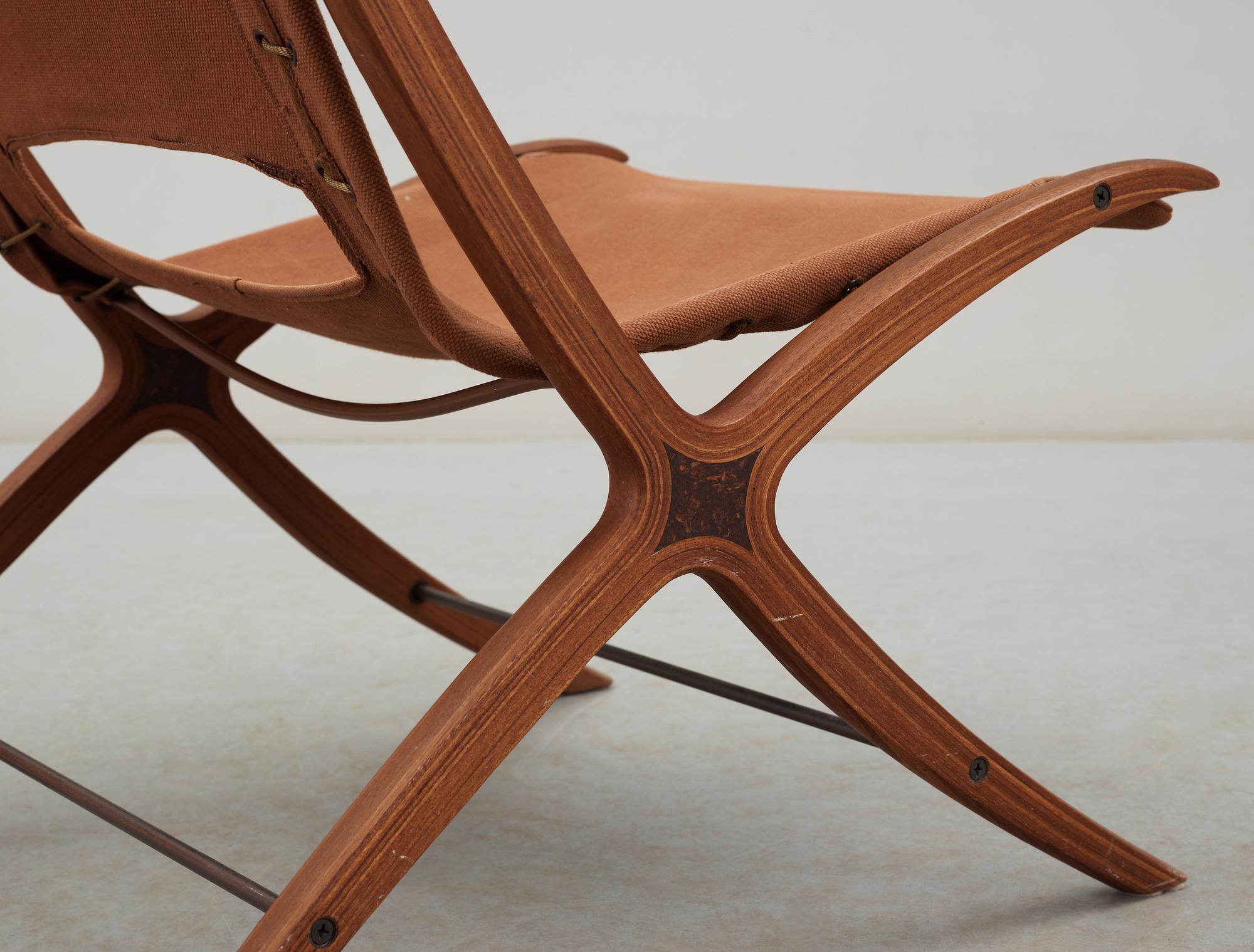 A Peter Hvidt & Orla Mølgaard Nielsen teak, beech and canvas 'X-Chair', Fritz Hansen, Denmark 1950's.