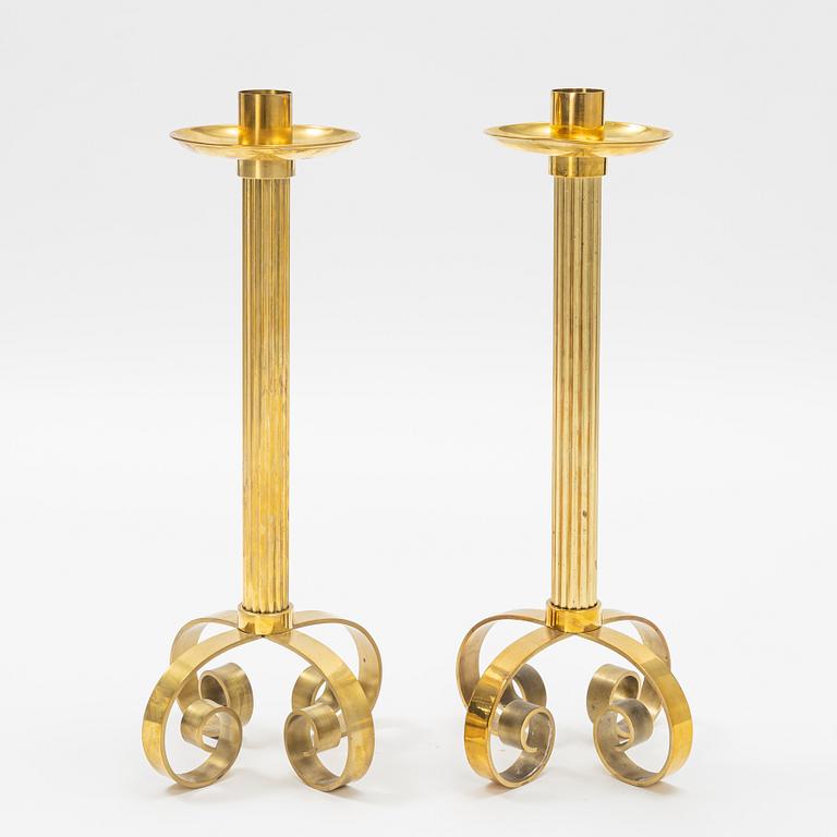 Ivar Ålenius-Björk, a pair of brass candle holders, Ystad Metall.