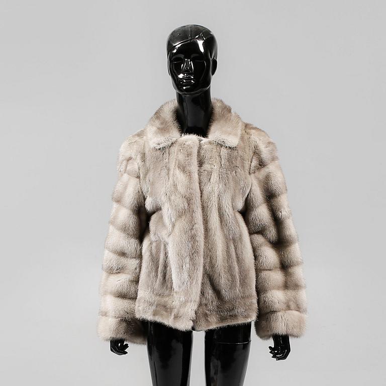 A GRAY MINK FUR JACKET.