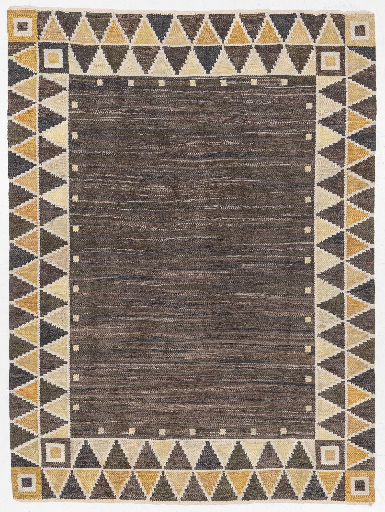 A flat weave rug, c. 245 x 185 cm.