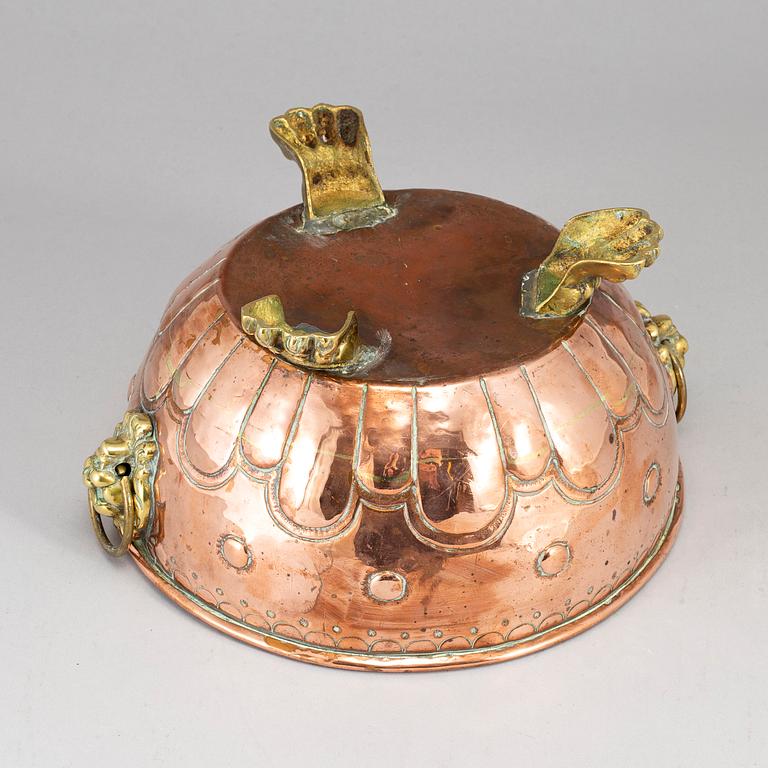 A 19th century copper and brass flower pot.