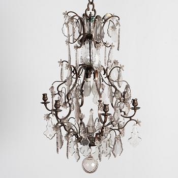 A Rococo style chandelier, early 20th century.