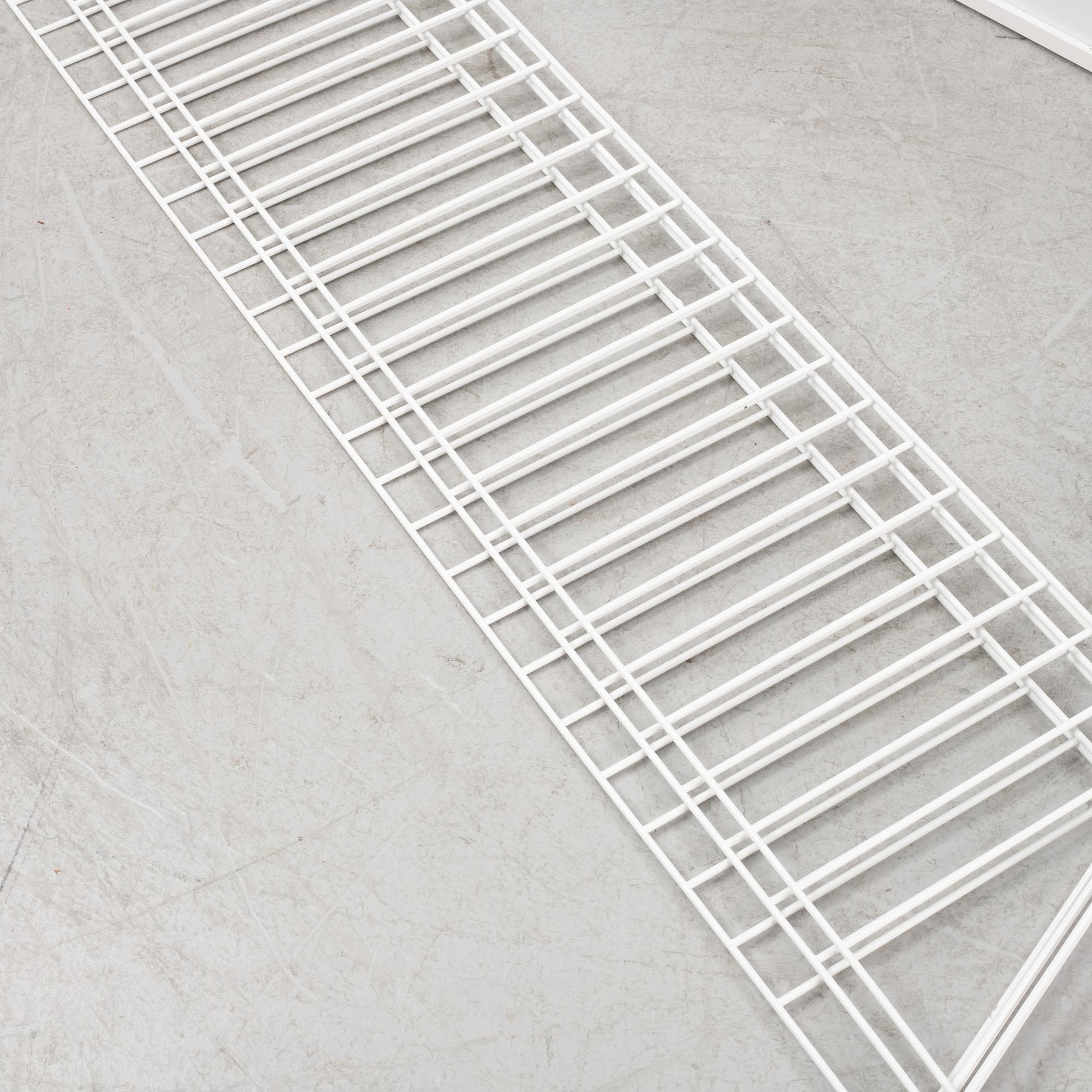 Nils Strinning, a 'String' shelving system, 21st Century.