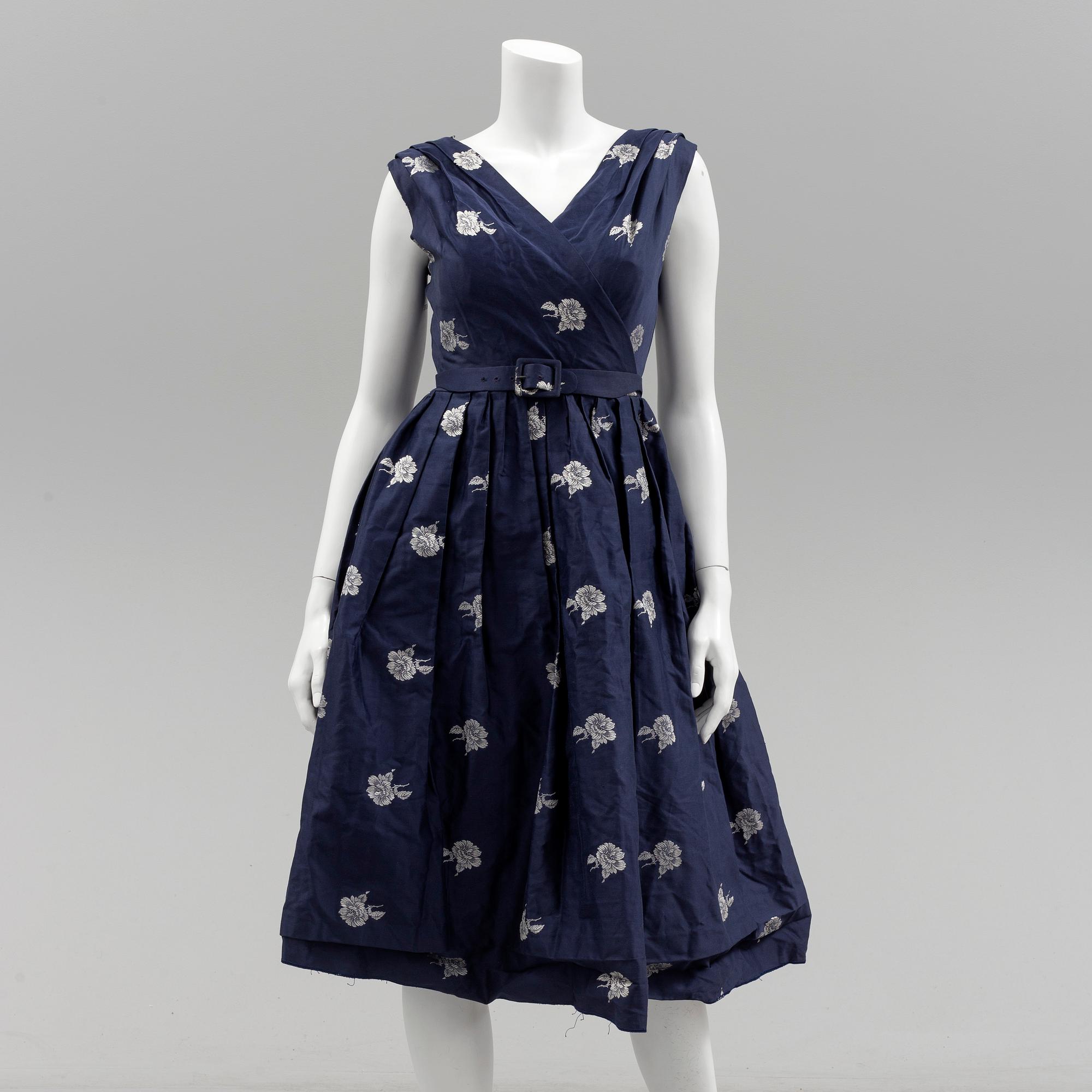 A Christian Dior 1950s midnight blue cocktail dress.