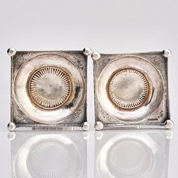 A pair of Swedish 18th century Gustavian silver candlesticks, marks of Arvid Floberg, Stockholm 1799.