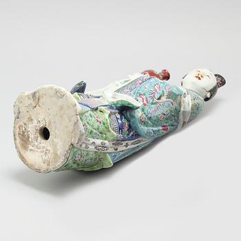 A porcelain figurine from China, late 19th or early 20th century.