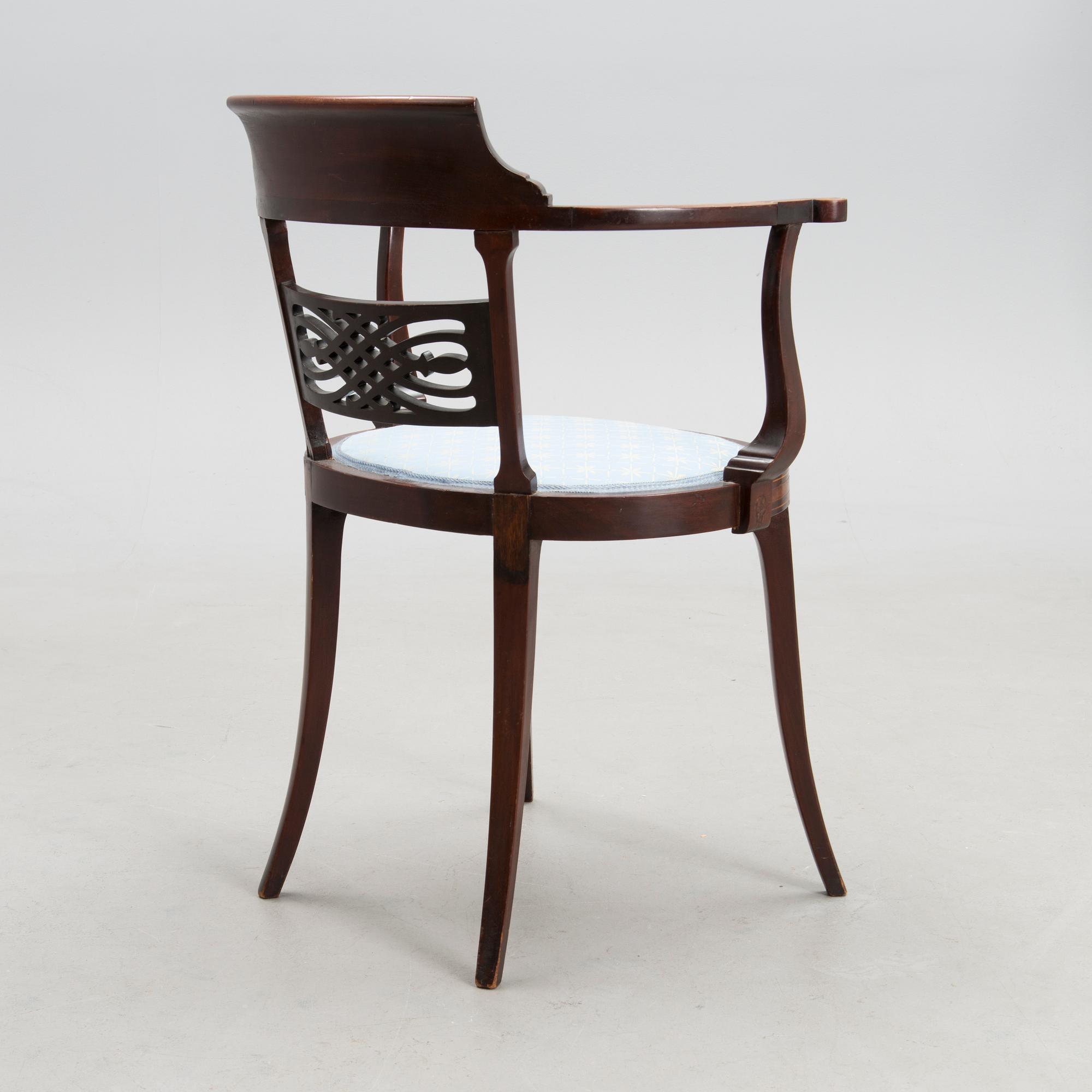 An Edward VII mahogany open armchair, circa 1900.