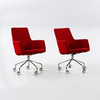 A pair of 21th century arm chairs by Roger Person, model "Happy", Swedese.