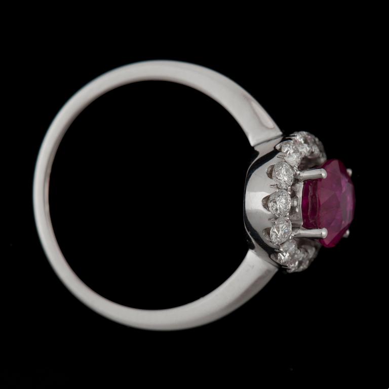A 1.69 ct ruby and brilliant-cut diamond ring. Total carat weight on diamonds circa 0.51 ct. Quality G-H/VS.