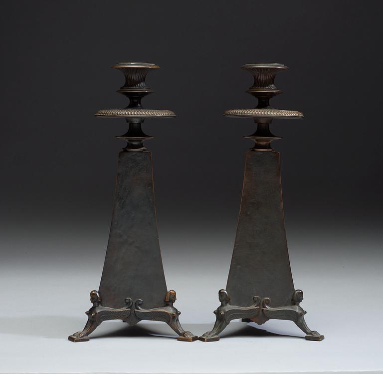 A pair of Melchior Wernstedt bronze candelsticks, foundry Herman Bergman AB.