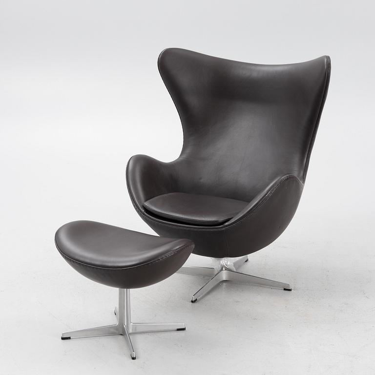 Arne Jacobsen, an "The Egg" armchair woth ottoman, Fritz Hansen, Denmark, 2003.