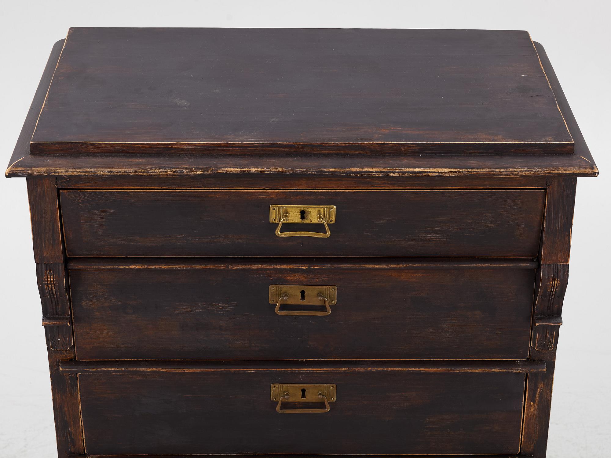 A chest of drawers, circa 1900.