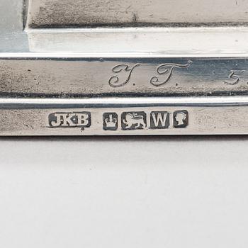 Two pairs of silver candlesticks, England 1889 and Finland 1975.
