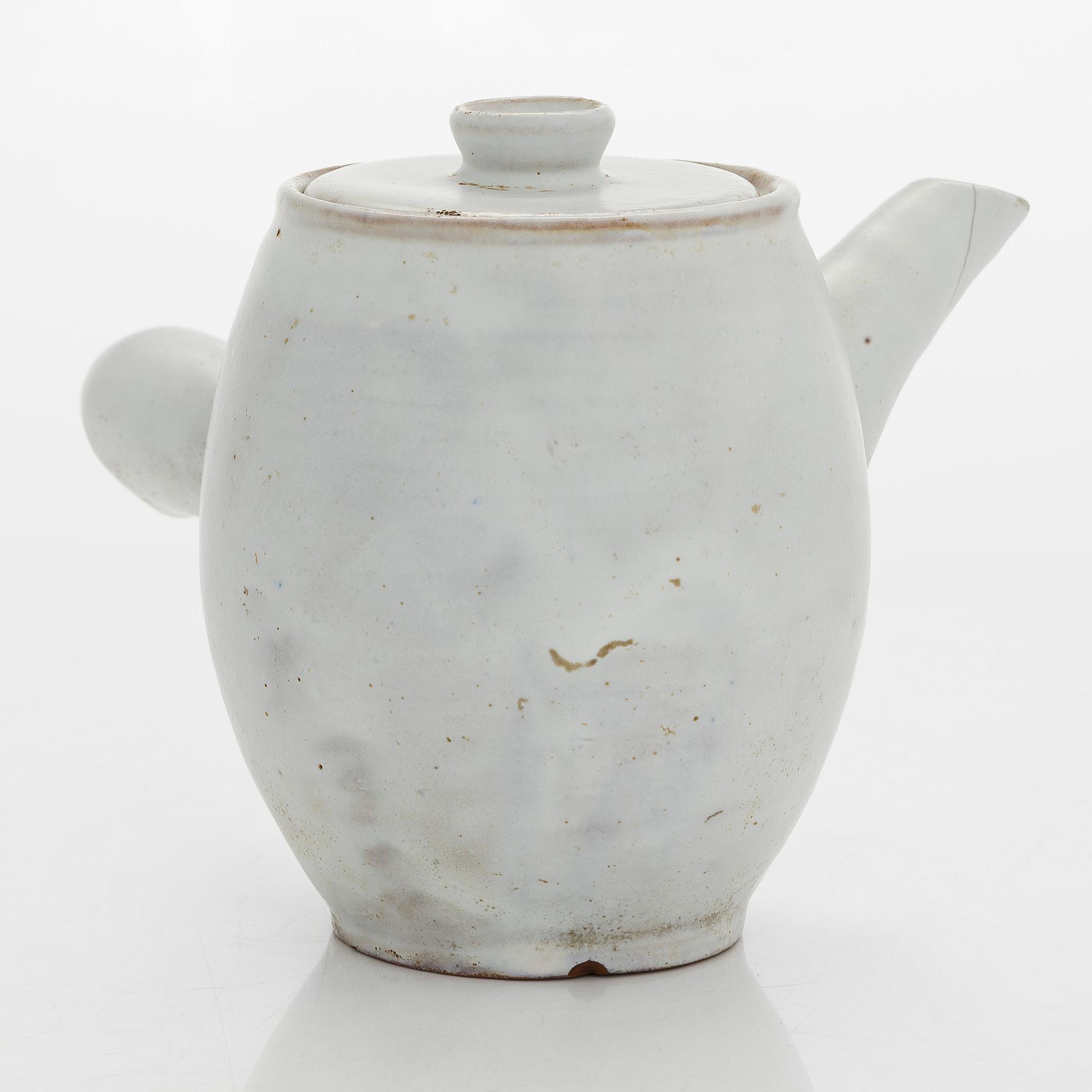 Marita Lybeck, a ceramic jug, signed ML.