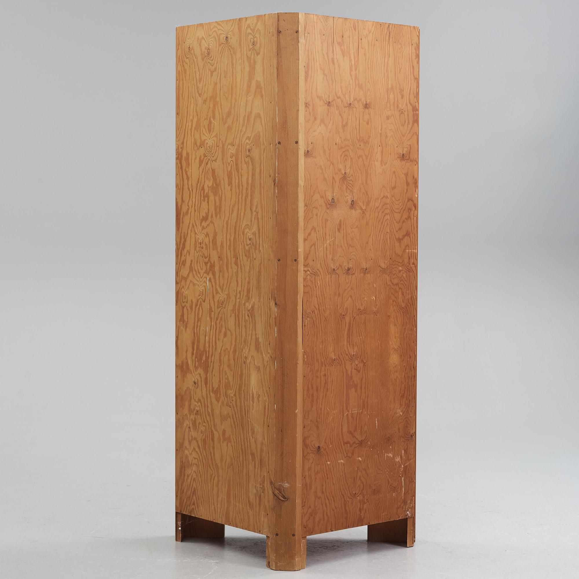 Axel Einar Hjorth, a stained pine "Utö" corner cabinet, Nordiska Kompaniet, Sweden, 1930s.