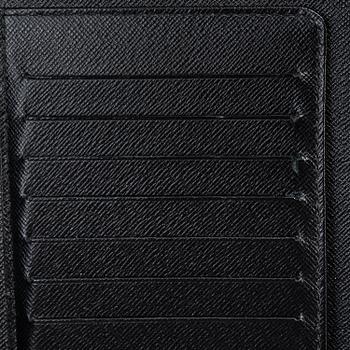 LOUIS VUITTON, an 'Atoll Ardiose' Taiga leather trave organizer, 2015.