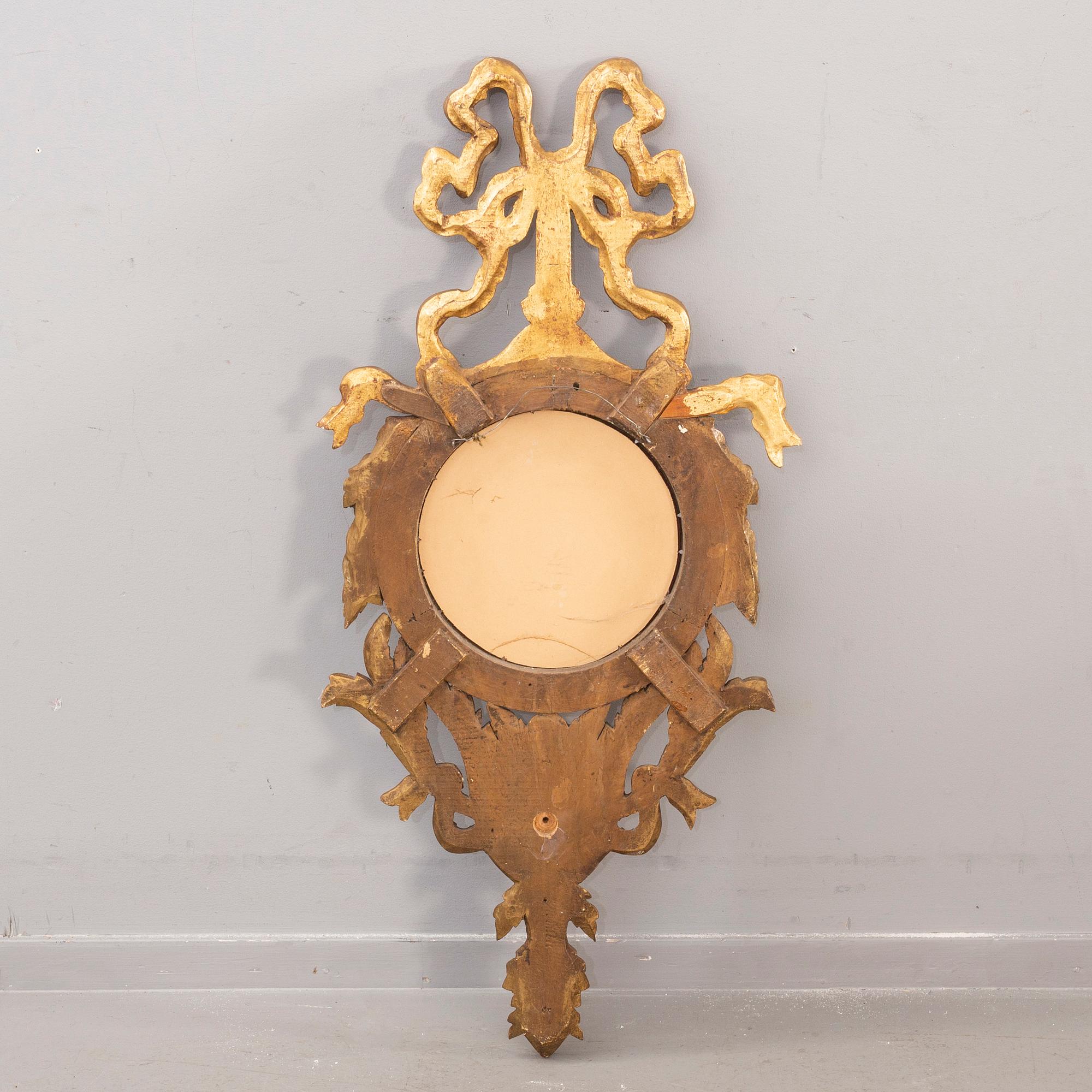 An mid 20th century wood mirror from Paoletti, Firenze Italy.