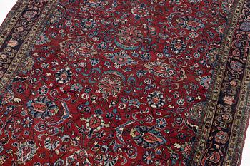 A Kashan rug, c. 208 x 138 cm.