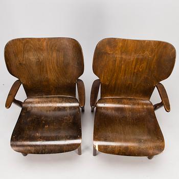 Ilmari Tapiovaara, A pair of 1950s 'Domus' armchairs for Keravan Puuteollisuus. Finland.
