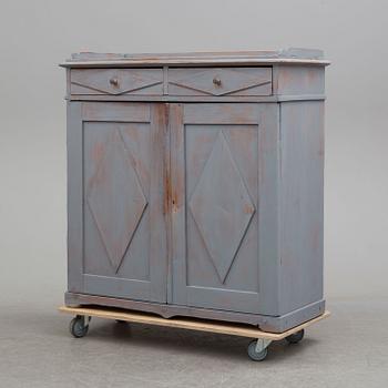 A first half of the 19th century painted cupboard.