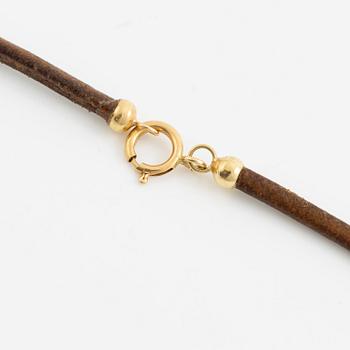 Necklace leather strap and 18K gold with amber.