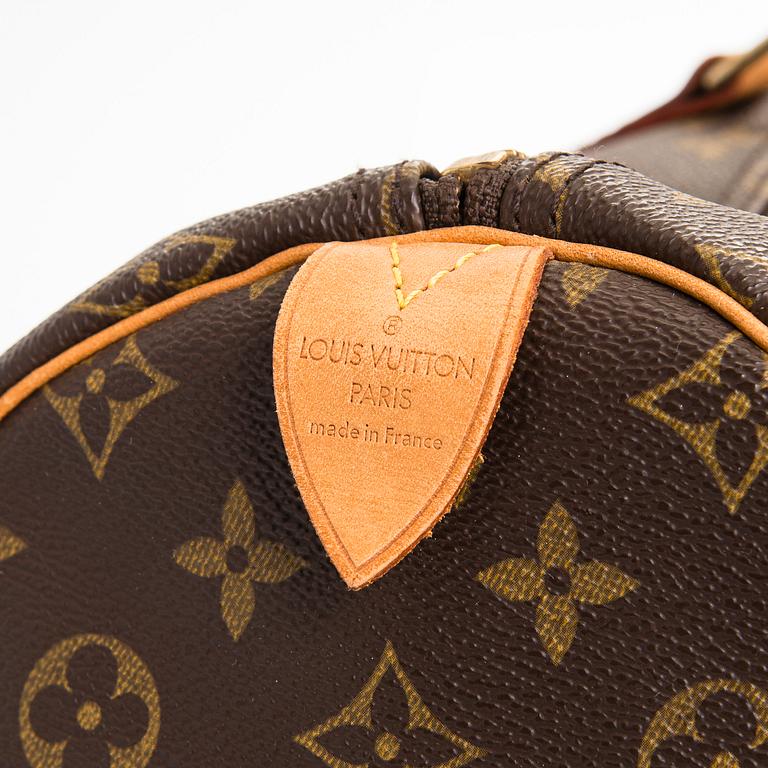 Louis Vuitton, a Monogram Canvas 'Keepall 55' bag.